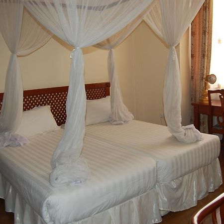 Arusha Tourist Inn Hotel Номер фото